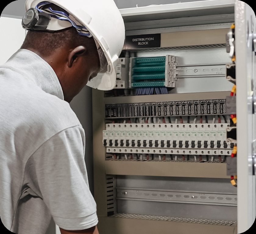 Compass engineers commissioning an LV panel on site